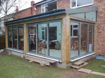 Mrs J. : Wallasey Wirral : Installation of Evolution door and and frames. Leaded side panels and Sand blast top light to clients design. 